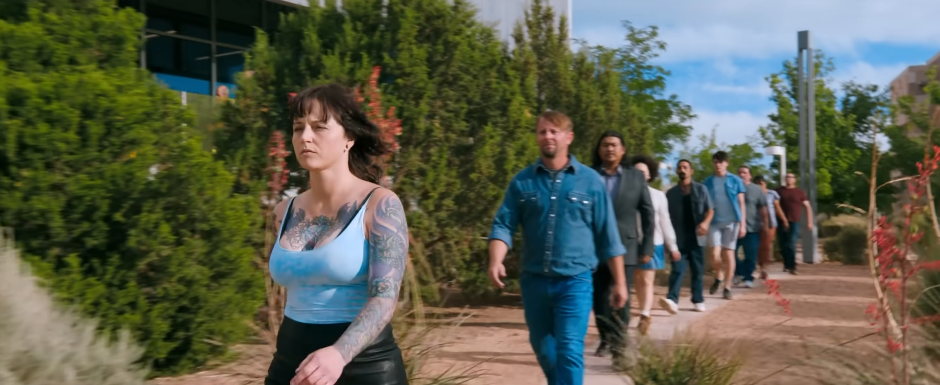 A wider shot highlighting general public, suggesting they are NPCs.